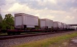 A long string of UPS trailers